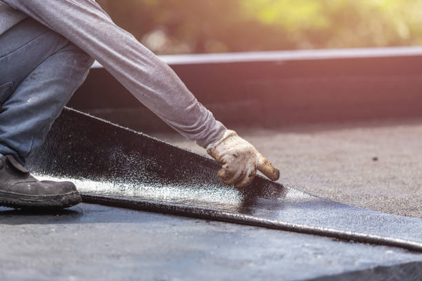 Professional Emergency Waterproofing technician working in Aurora, IL